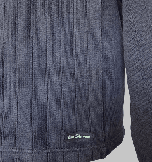 Ben Sherman Ribbed V-Neck Navy Blue Jumper close-up showing fabric texture and brand logo.