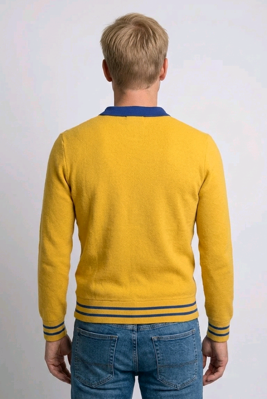 Man wearing a yellow sweater with blue accents