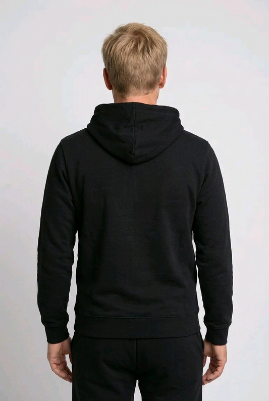 Man wearing a black hoodie from behind