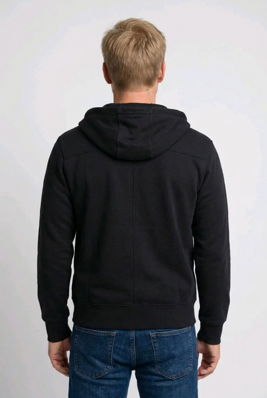 Man wearing a black hoodie from behind