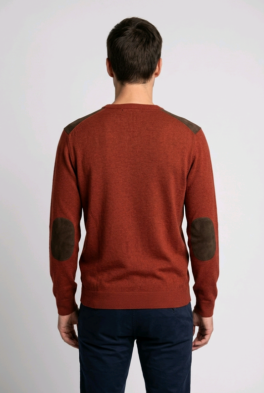 Man wearing a red sweater with elbow patches
