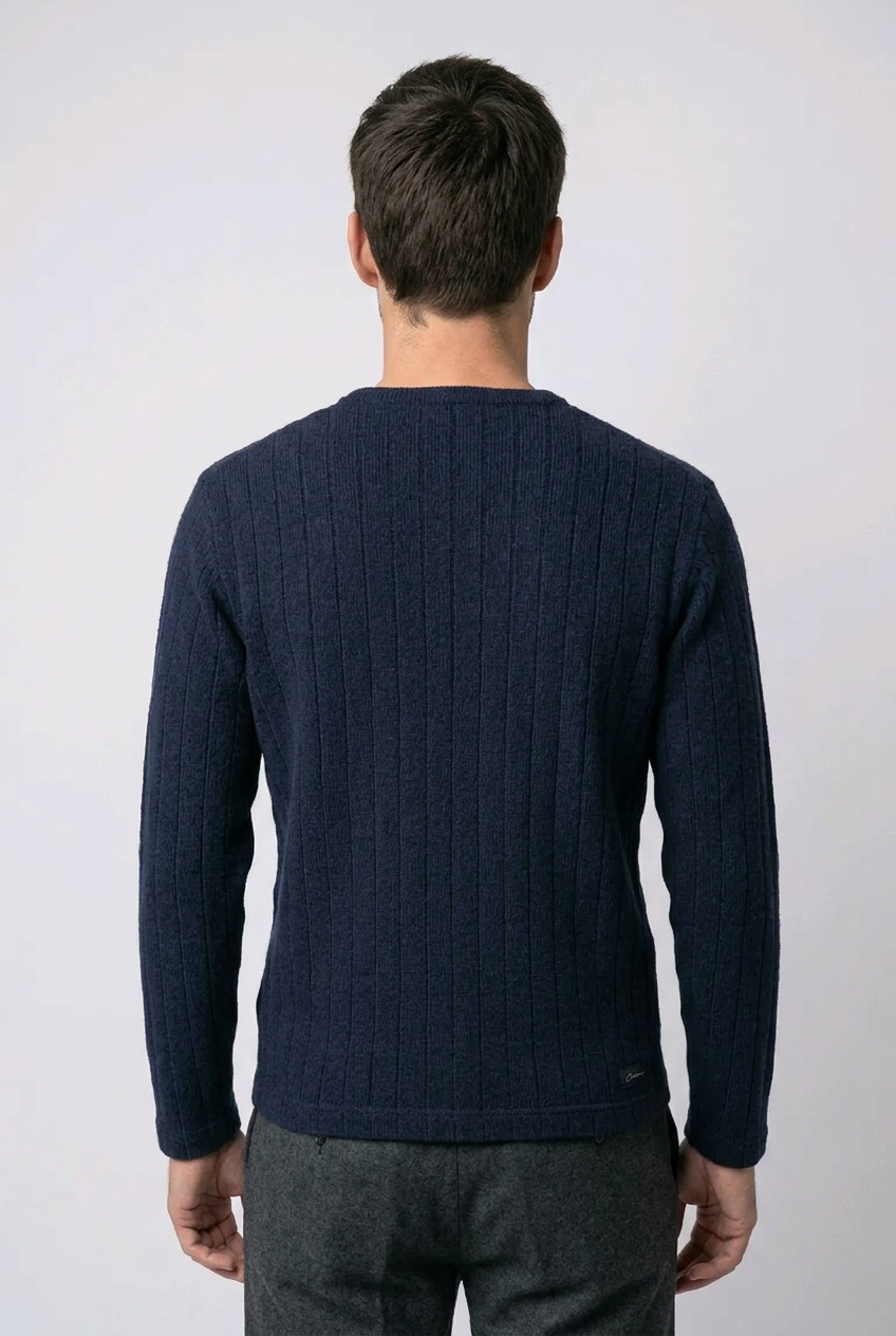 Man wearing a navy blue sweater