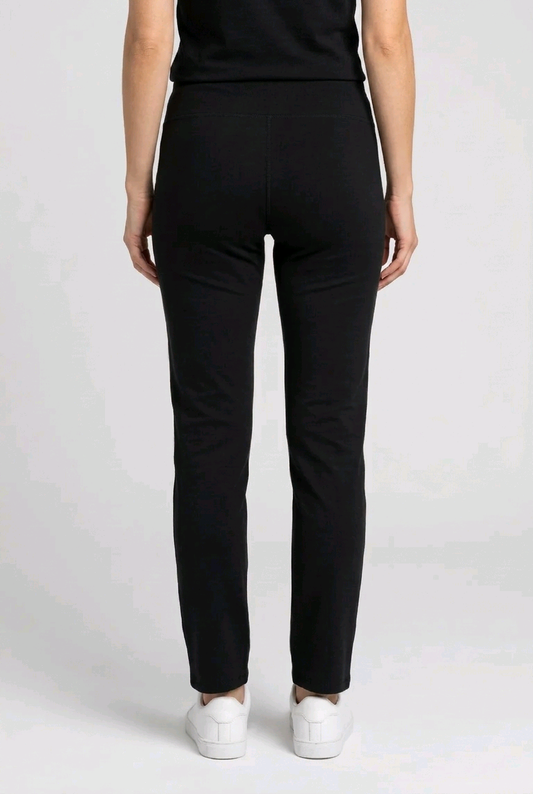 Woman wearing black Leggings back view