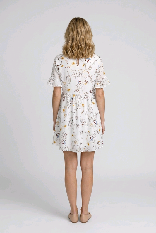 Woman wearing a bird dress back view