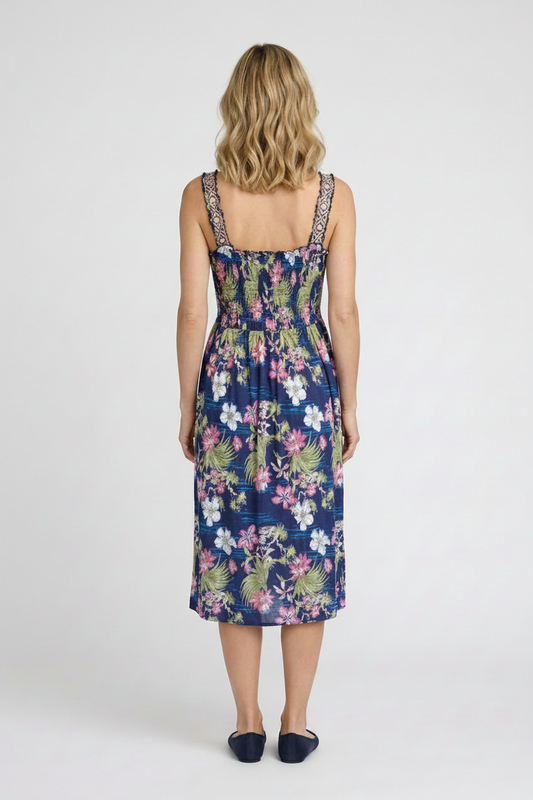 Woman wearing a floral dress back view