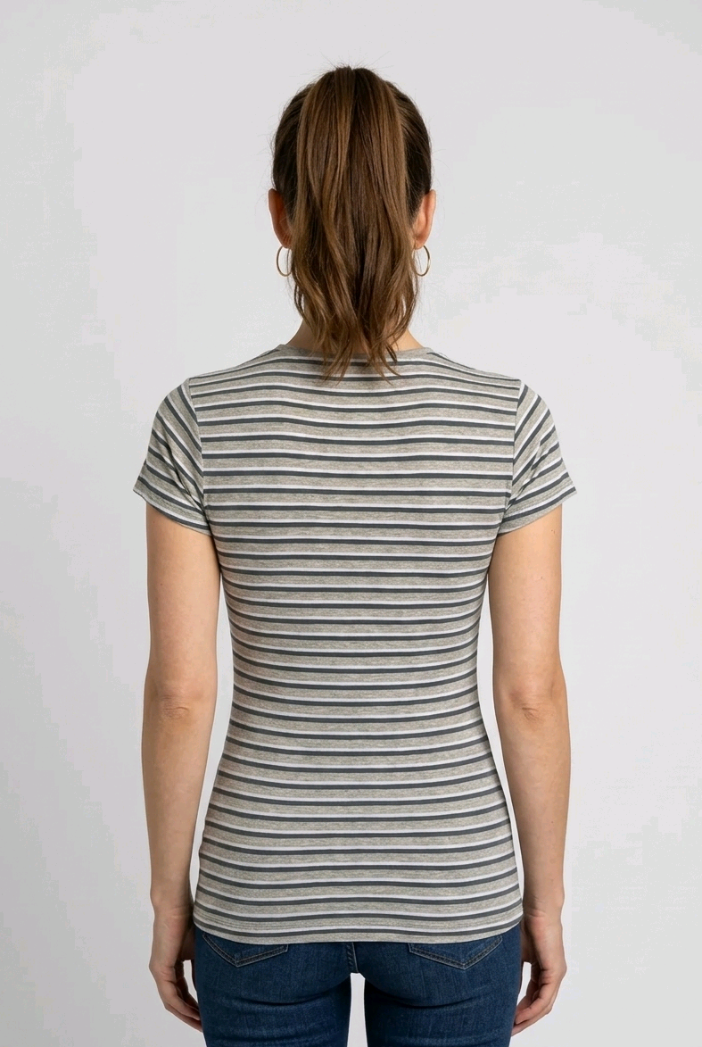 Woman wearing a striped t-shirt and jeans