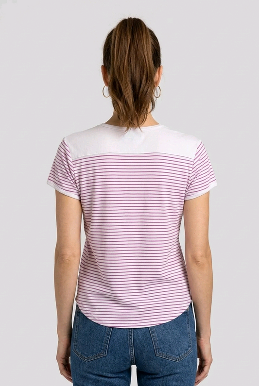 Person wearing a striped t-shirt and blue jeans