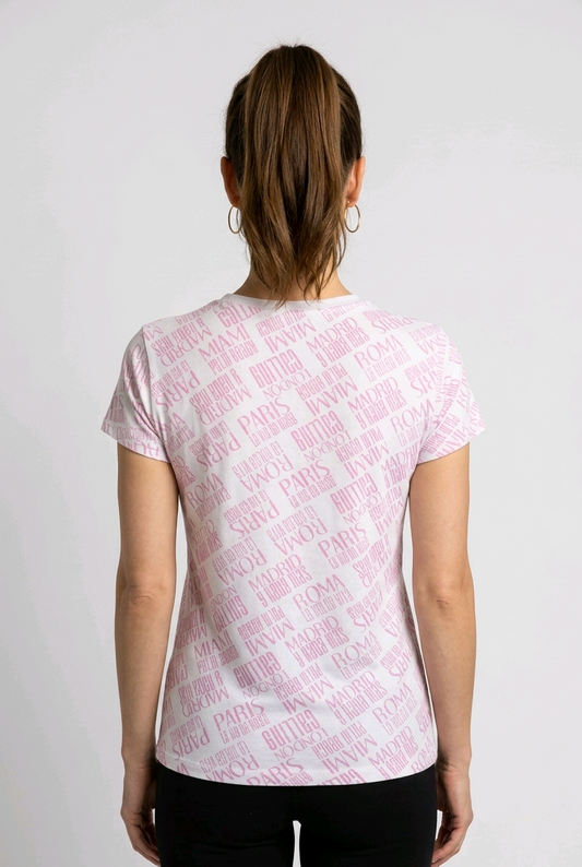 Woman wearing a pink t-shirt with text pattern on the back