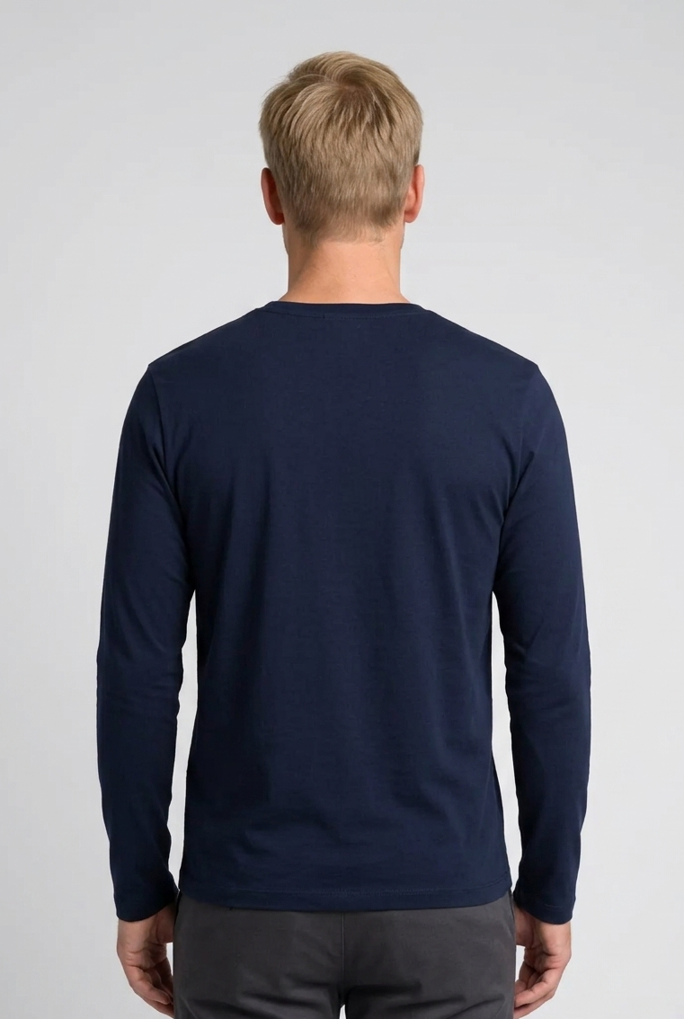 Man wearing a navy long-sleeve shirt