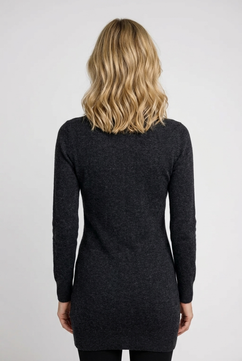 Woman wearing a dark grey long-sleeve jumper dress