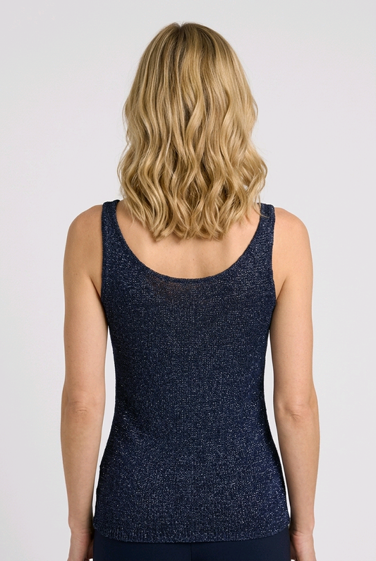 Woman wearing a navy blue tank top
