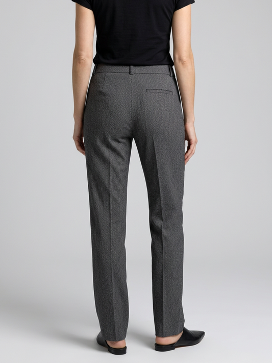 Woman wearing grey trousers