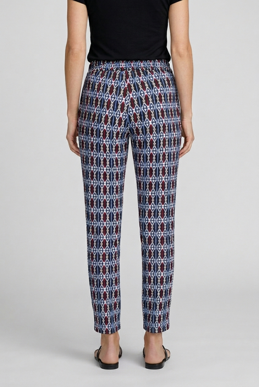 Person wearing patterned trousers back view