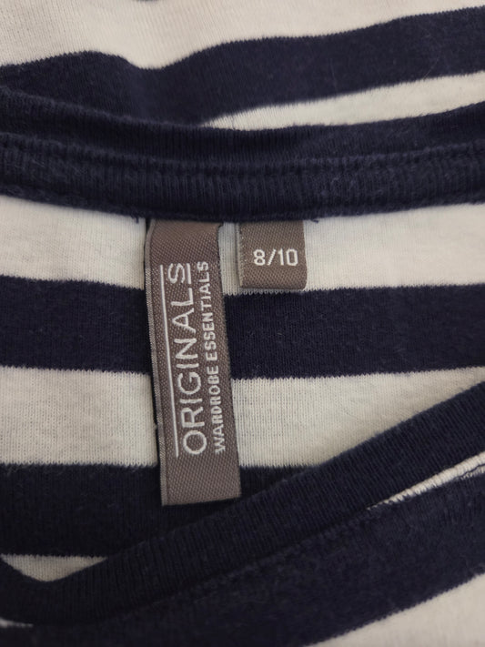 Close-up of a striped garment with a size label