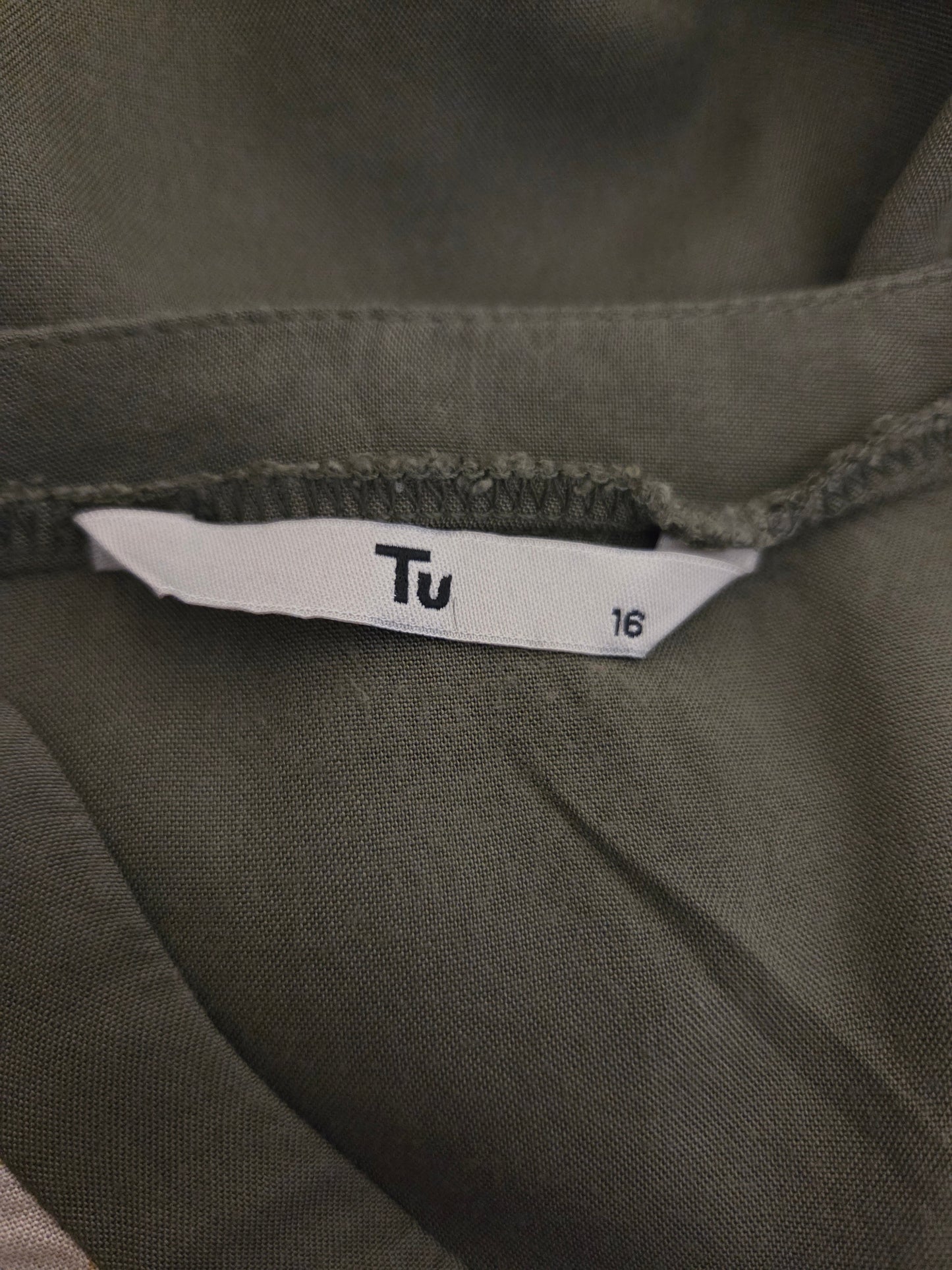 Close-up of a TU size label