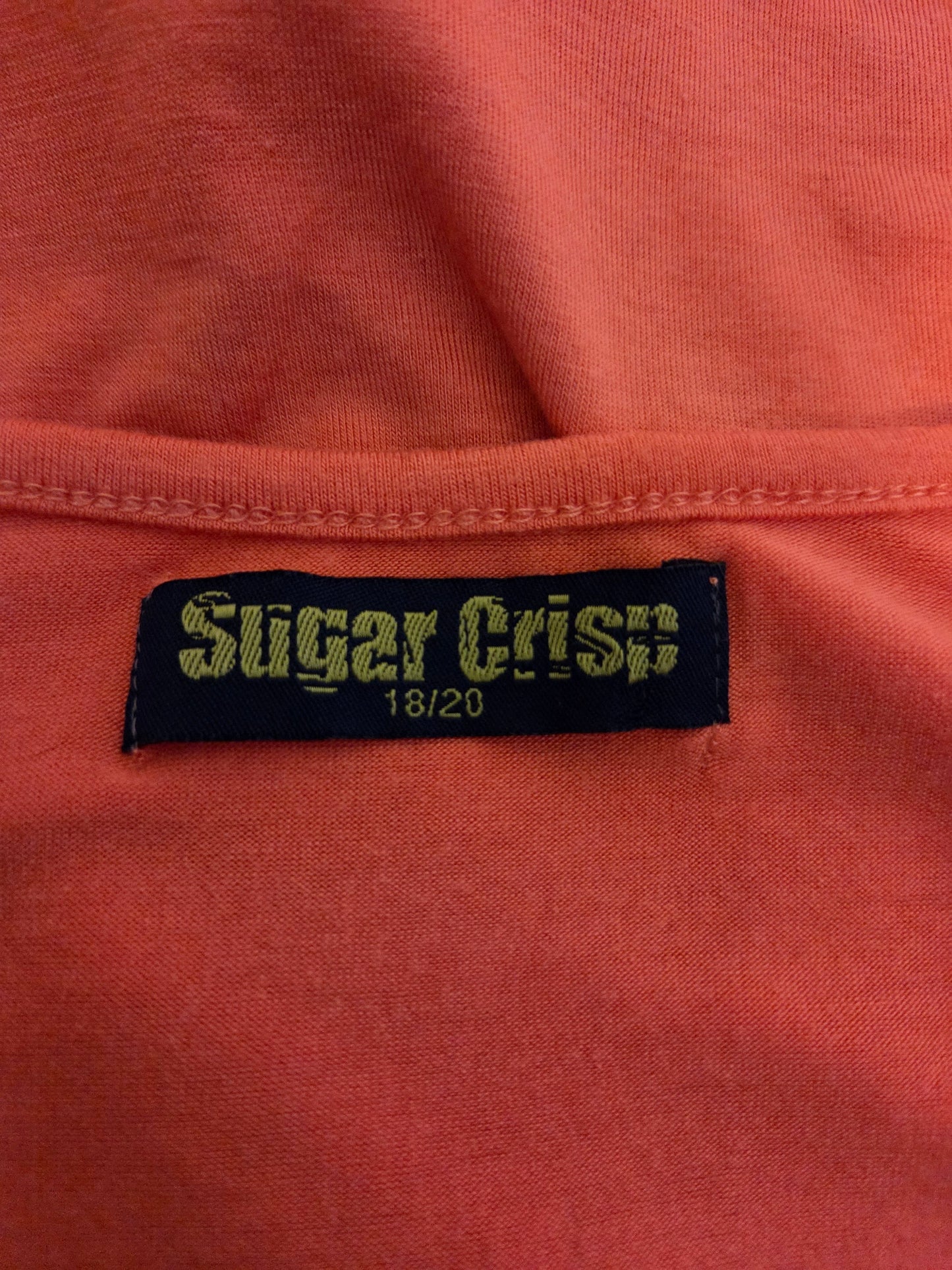 Close-up of a 'Sugar Crisp' size label