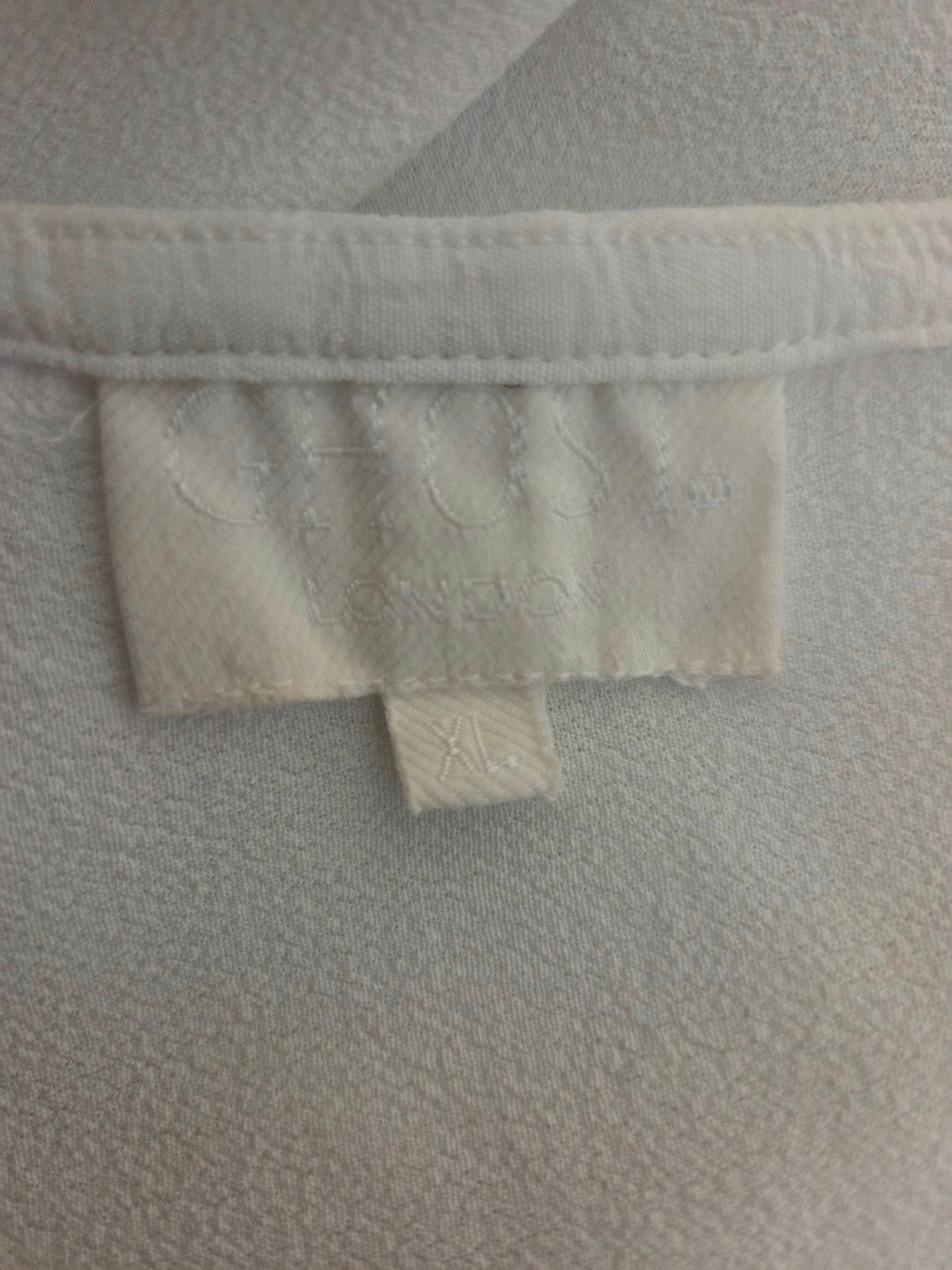 Close-up of Ghost size label