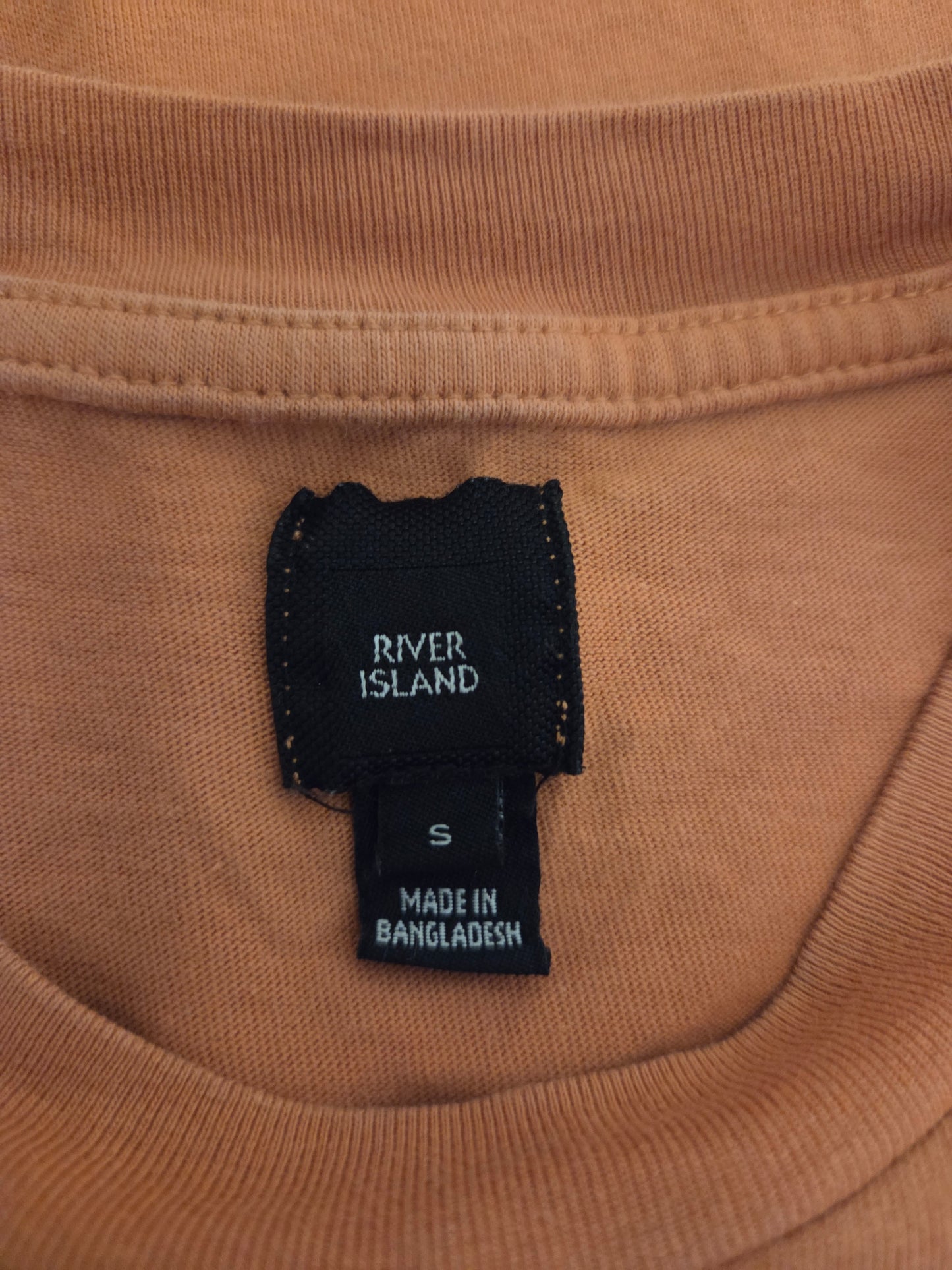 River Island orange script logo t-shirt UK small Pre-loved clothing size label