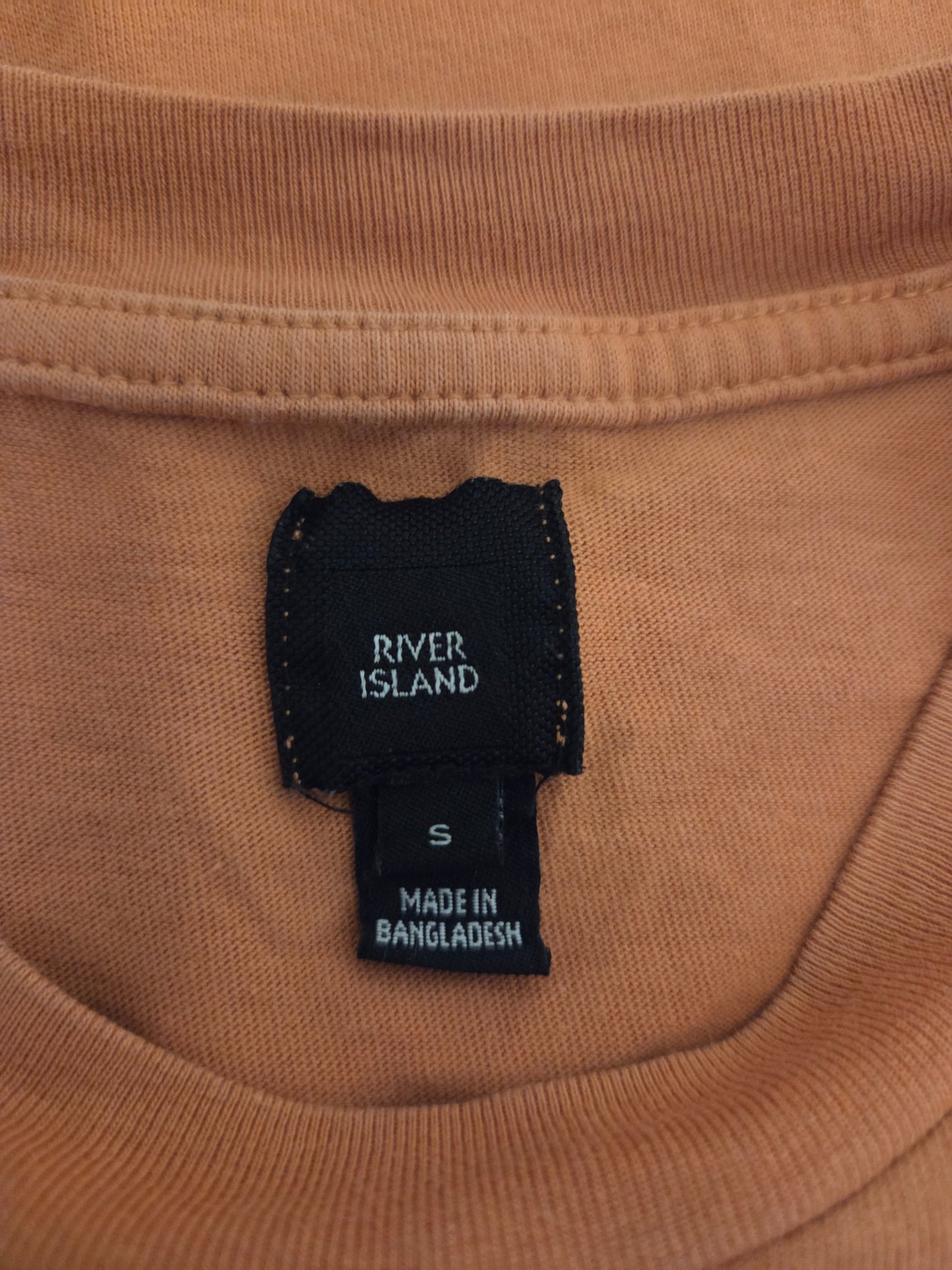 River Island orange script logo t-shirt UK small Pre-loved clothing size label