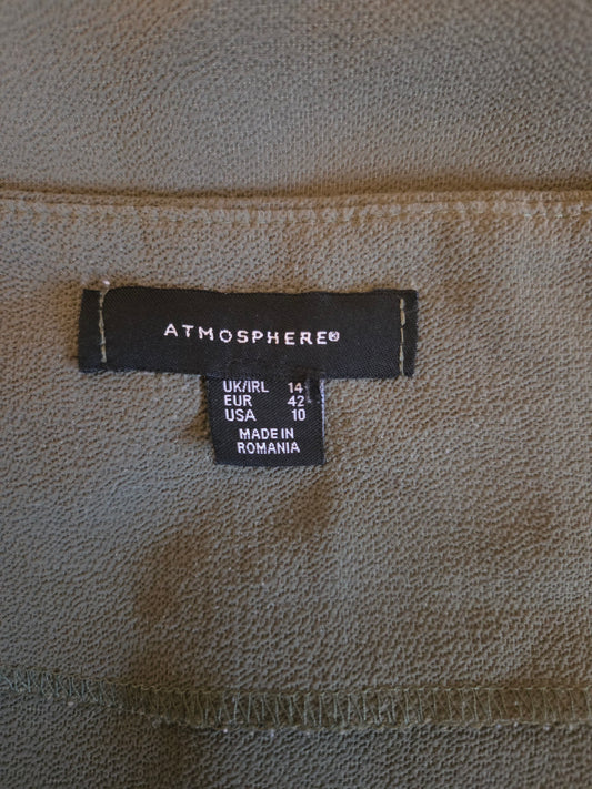 Size label on a textured fabric background