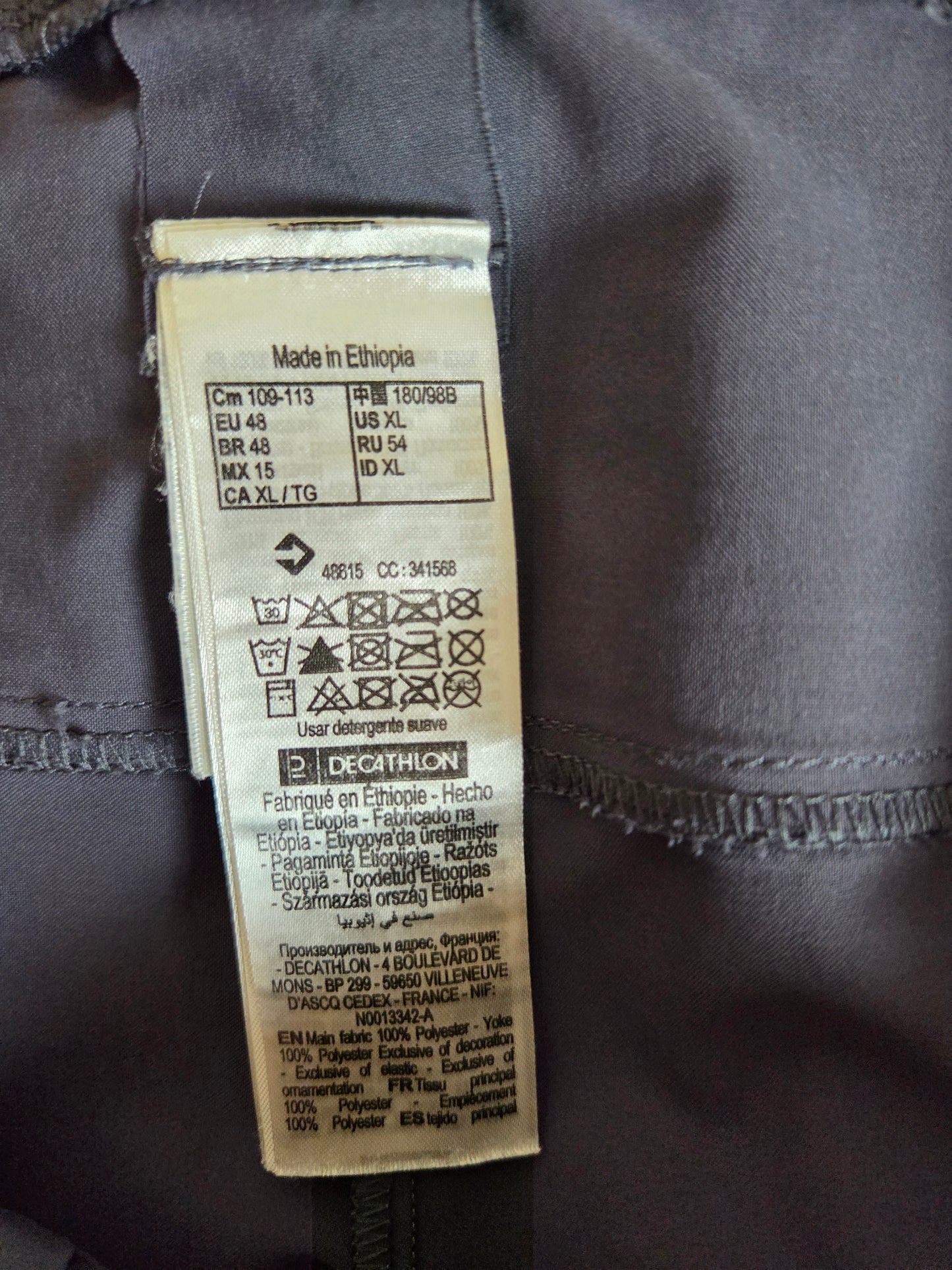 Clothing label on a dark fabric background