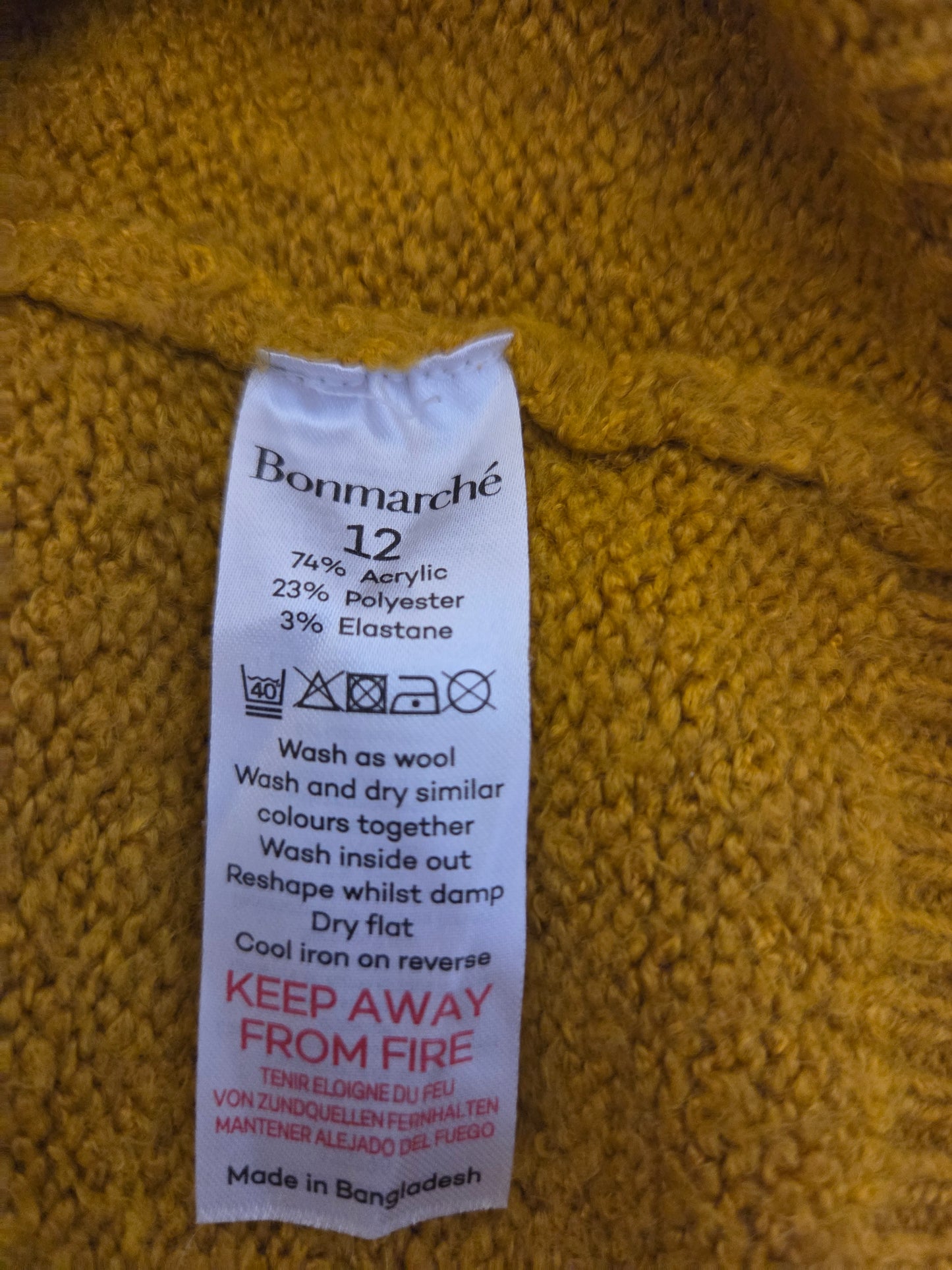 Size label on a yellow fabric