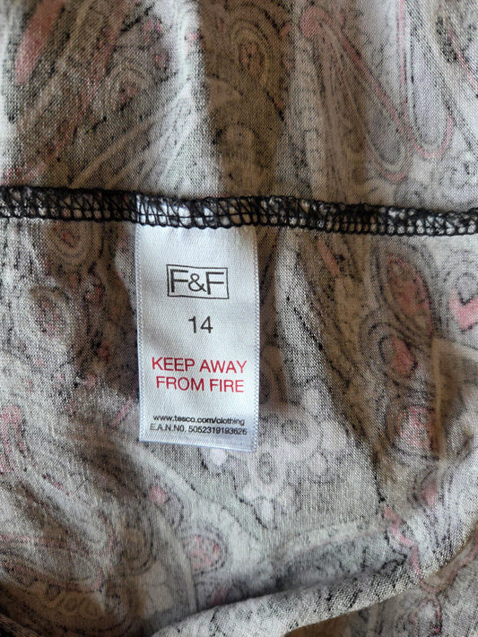 Fabric with a patterned label featuring the brand 'F&F'.