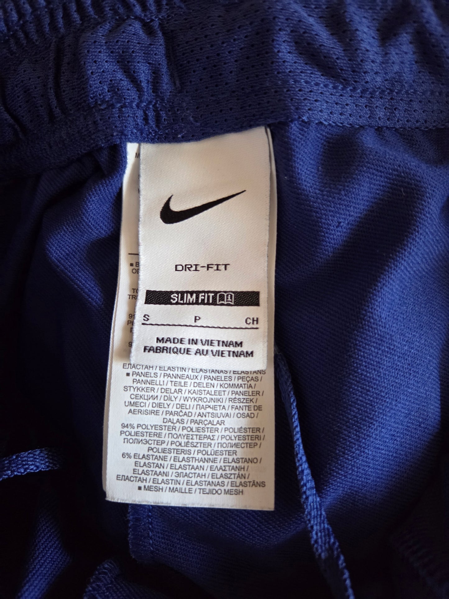 Size label showing Nike swoosh tag