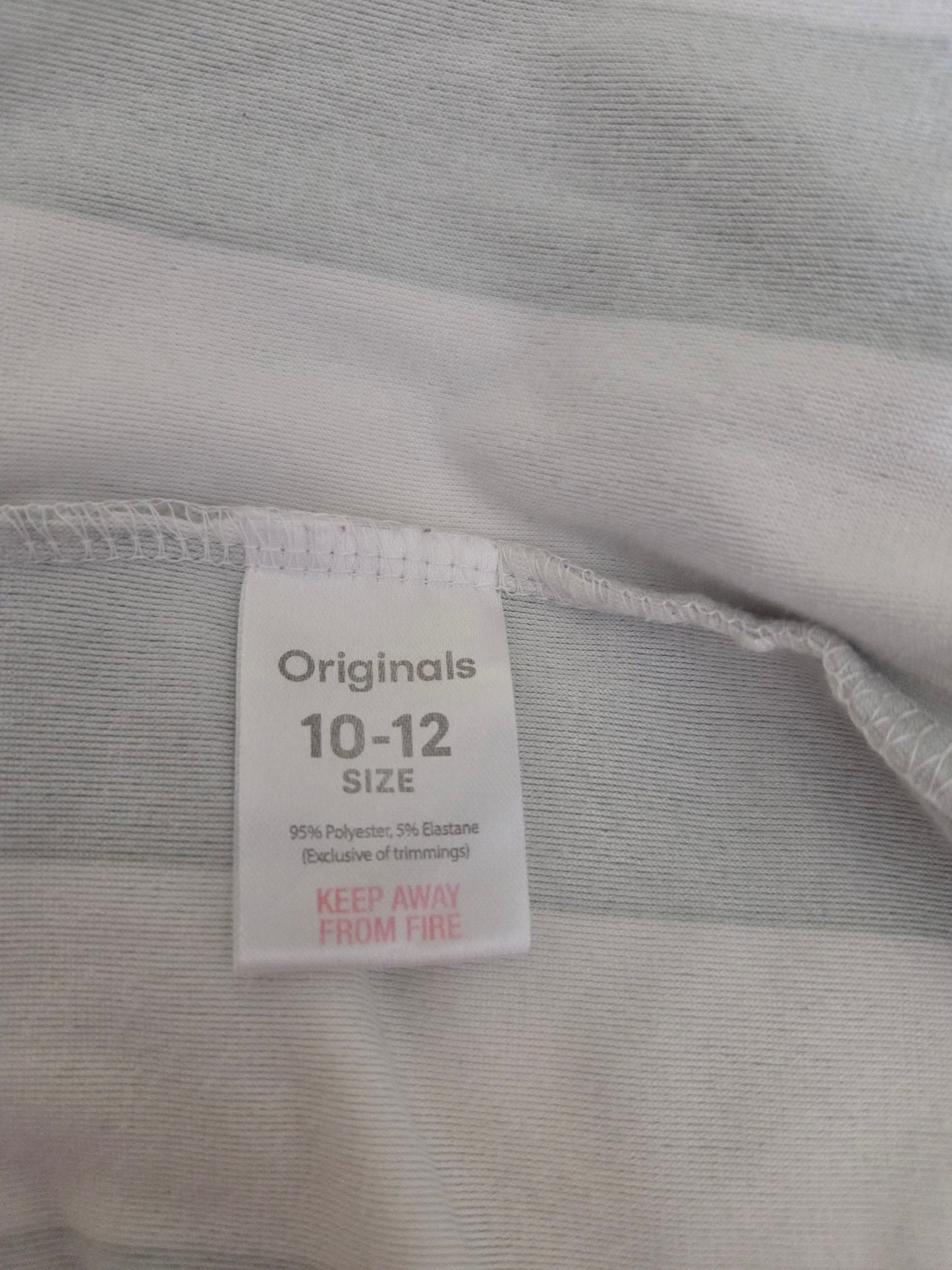 size label on green & white pjyamas