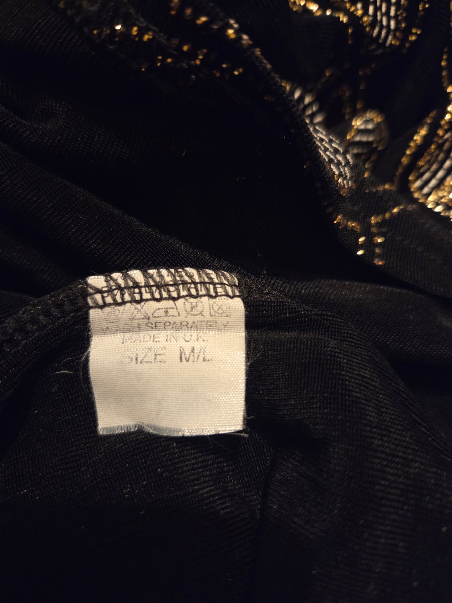 Size label on a black material