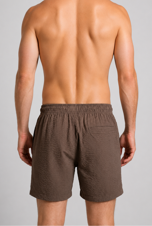 Back view of brown swim shorts