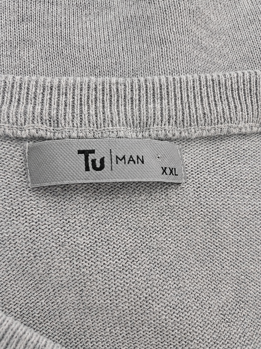 TU Man size label