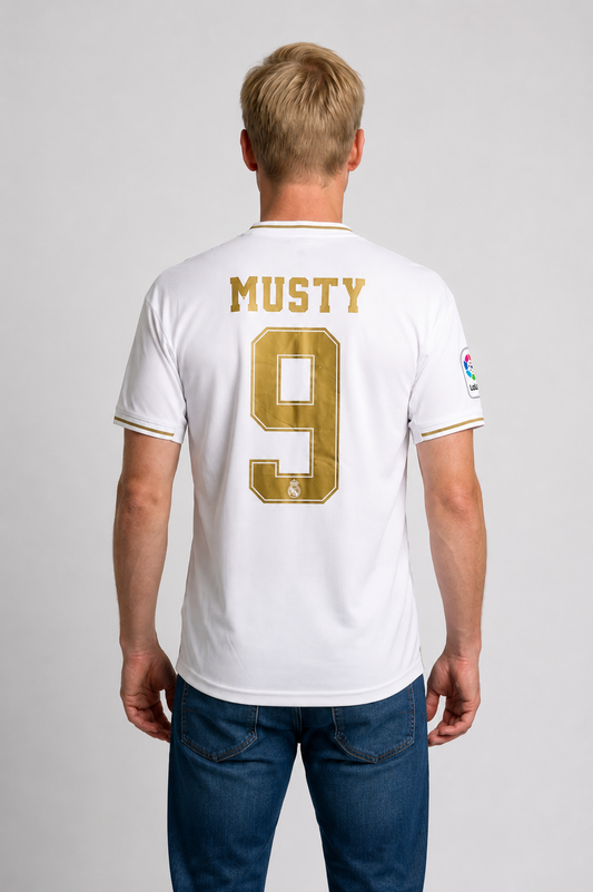 Person wearing a white sports jersey with 'Musty' and number '9' on the back