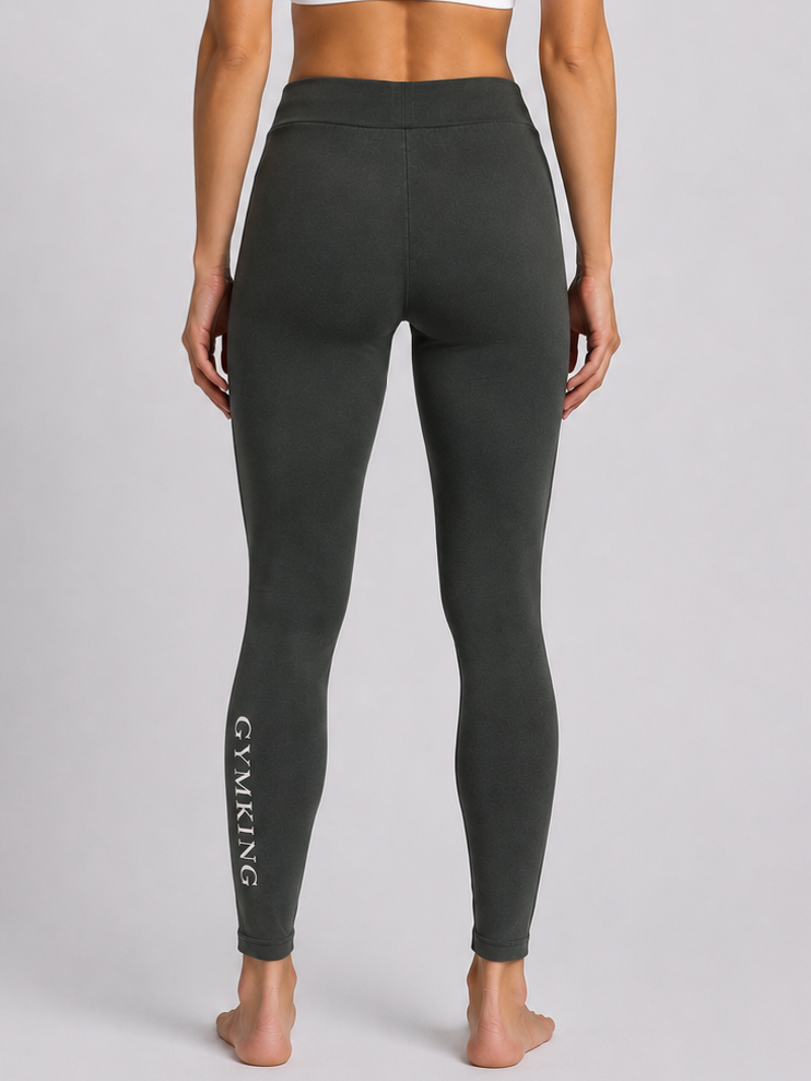 Dark green leggings with 'GYMKING' branding
