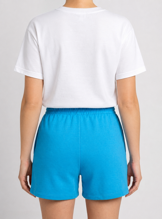 Person wearing a white t-shirt and blue shorts back view