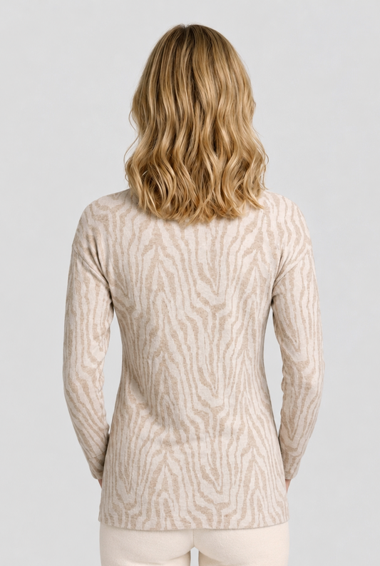 Woman wearing a beige pattern sweater