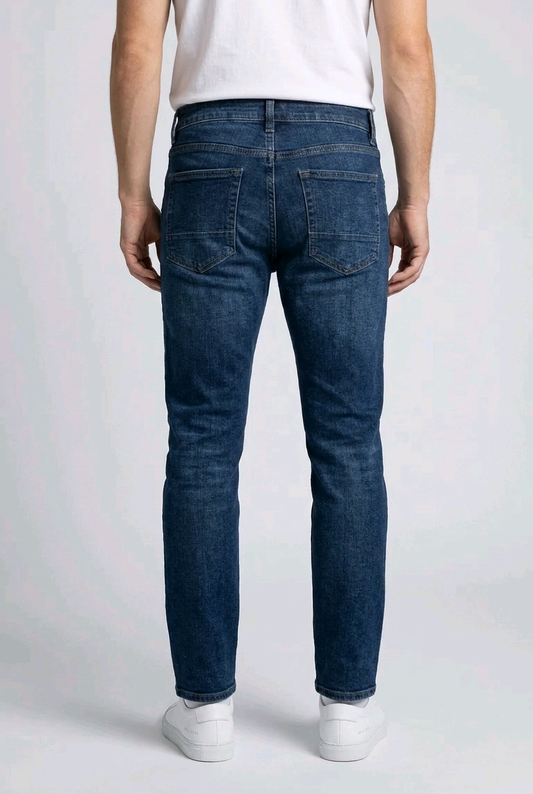 Man wearing blue jeans back view
