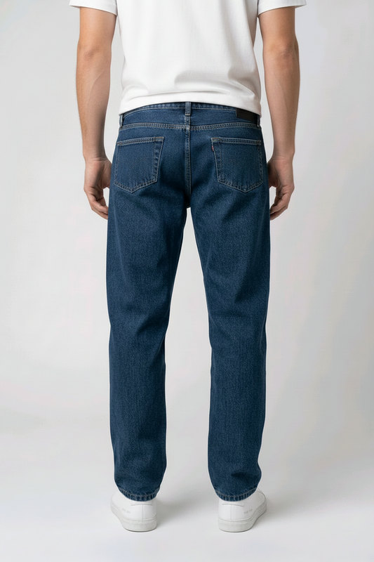 Man wearing blue jeans back view