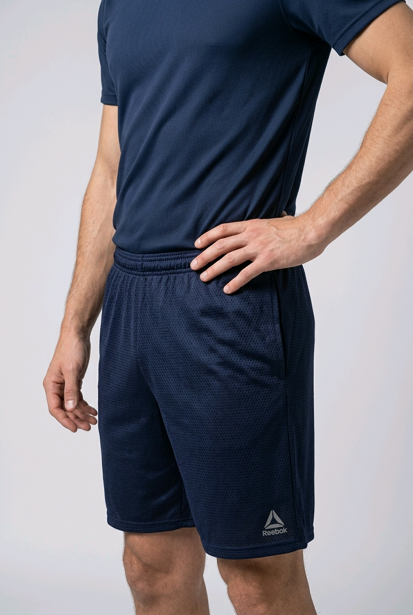 Man wearing navy Reebok shorts