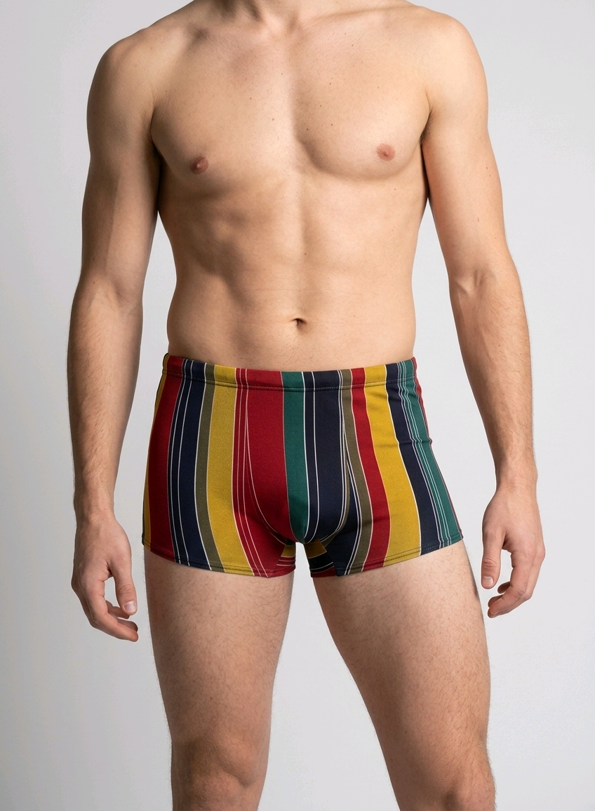 Man wearing colorful striped swim shorts 
