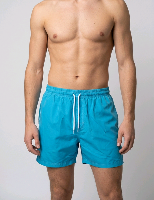 Man wearing blue swim shorts 