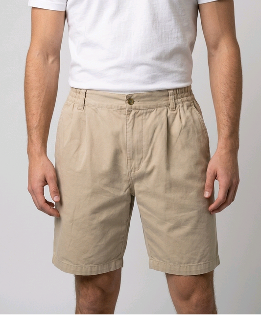 Man wearing beige shorts with a white t shirt