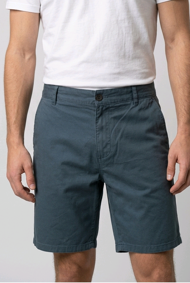 Man wearing teal chino shorts