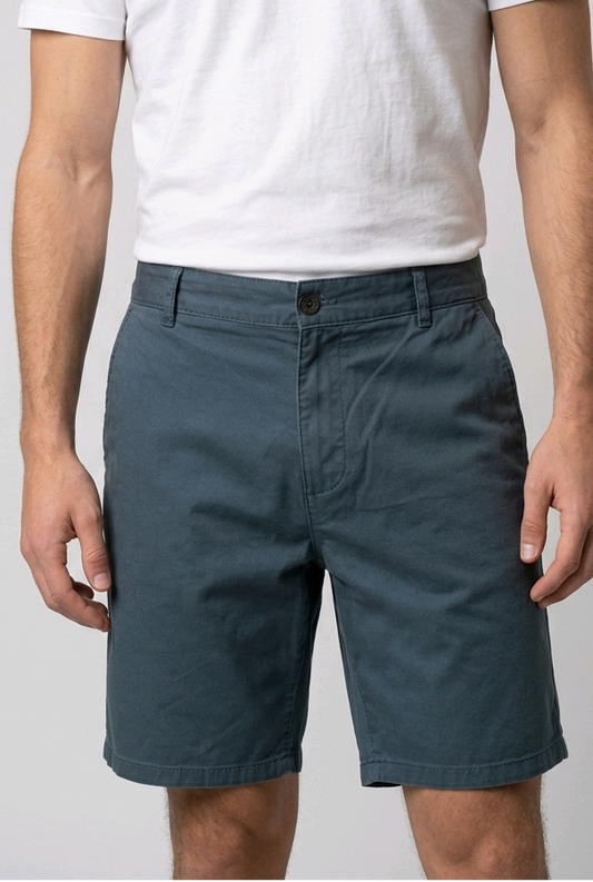 Man wearing teal chino shorts
