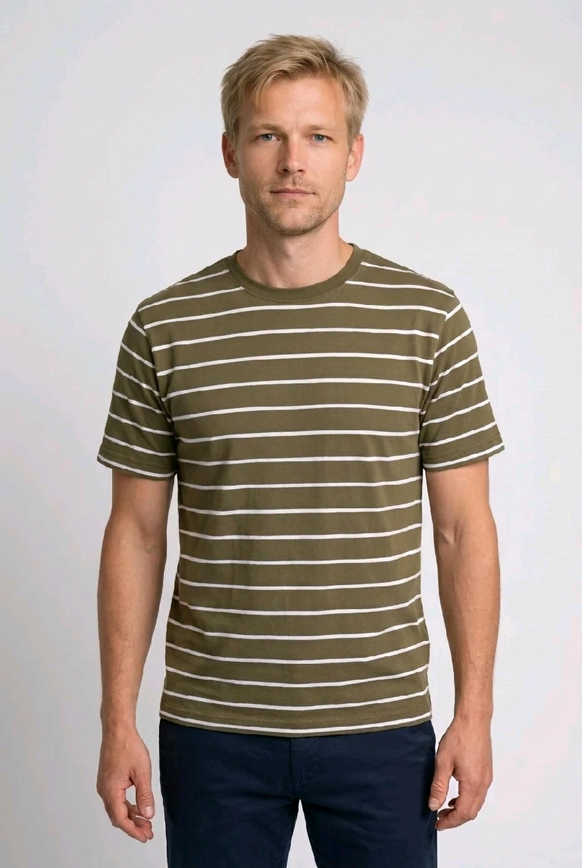 Man wearing a green and white striped t-shirt 