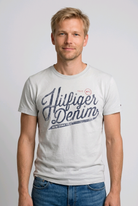 Man wearing a Tommy Hilfiger Denim t-shirt 