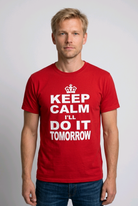 Man wearing a red t-shirt with text 'KEEP CALM I'LL DO IT TOMORROW' t shirt