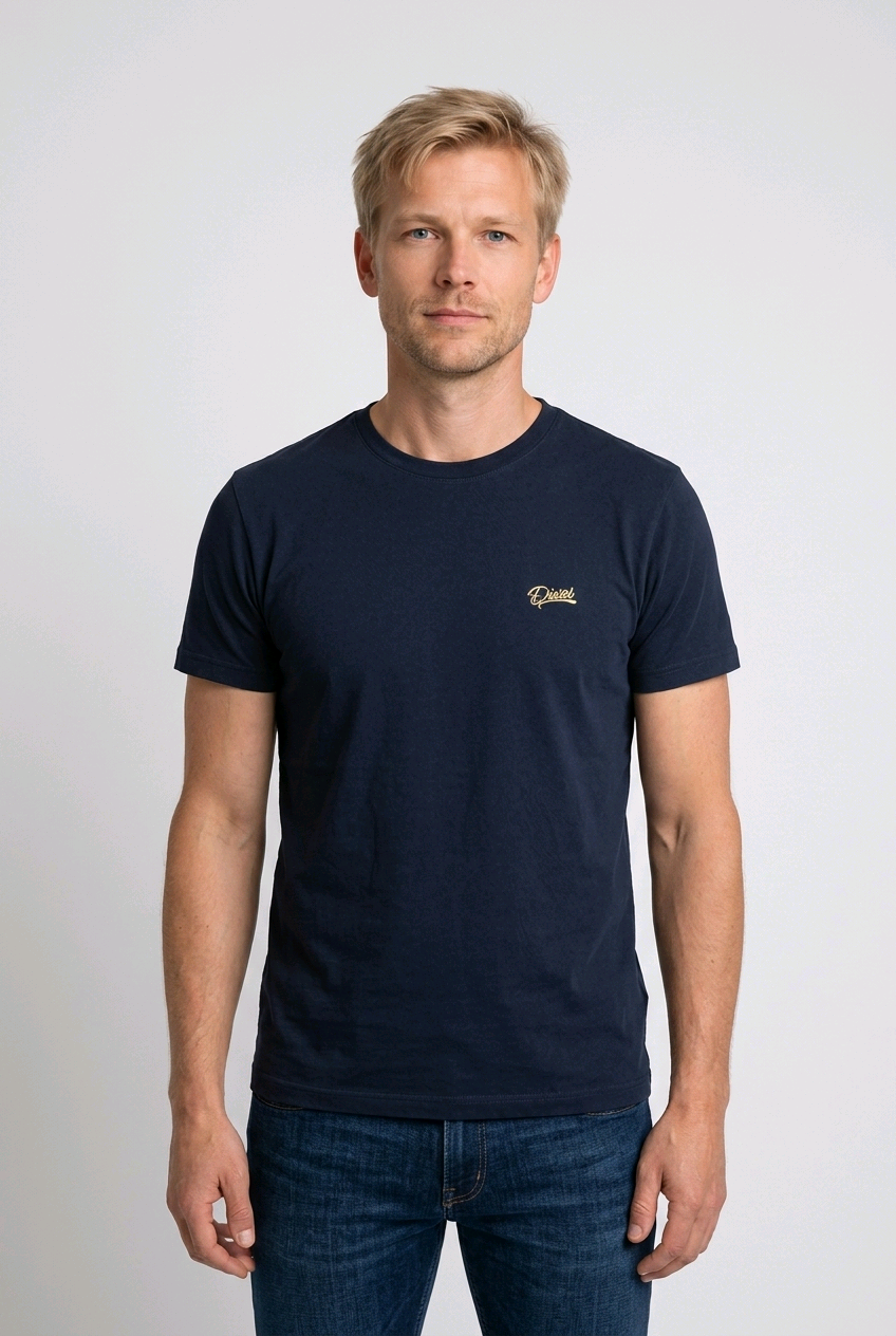 Man wearing a Diesel navy blue t-shirt with a small logo
