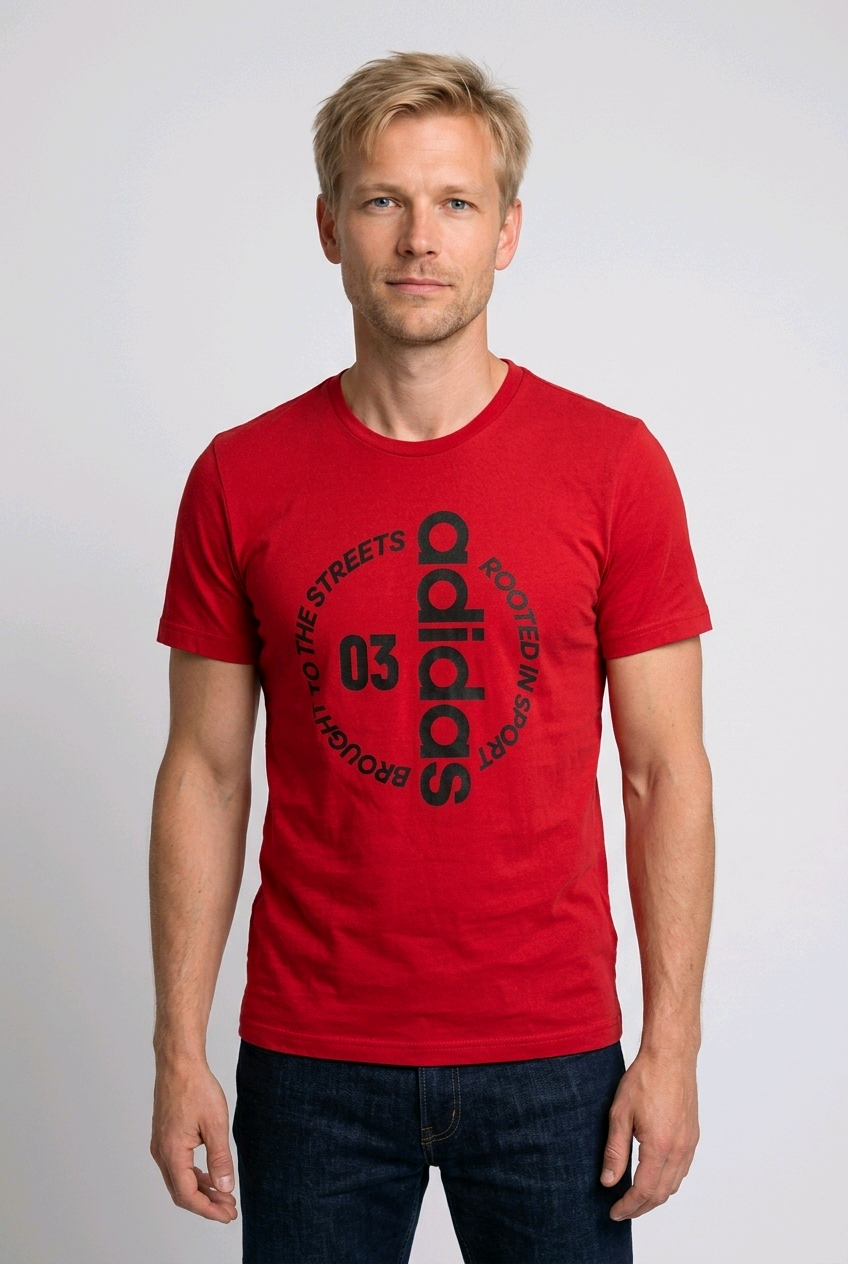 Man wearing a red Adidas graphic print t shirt