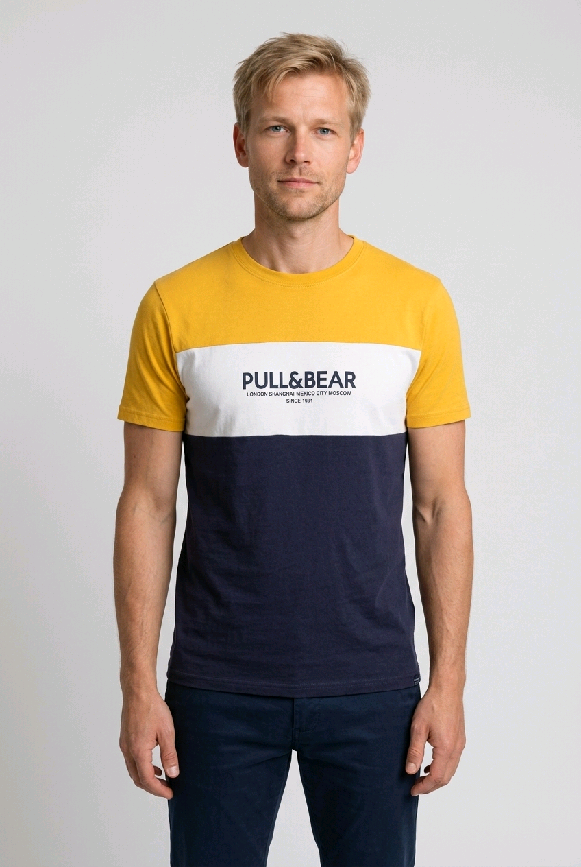 Man wear a mustard and navy pull & bear t shirt